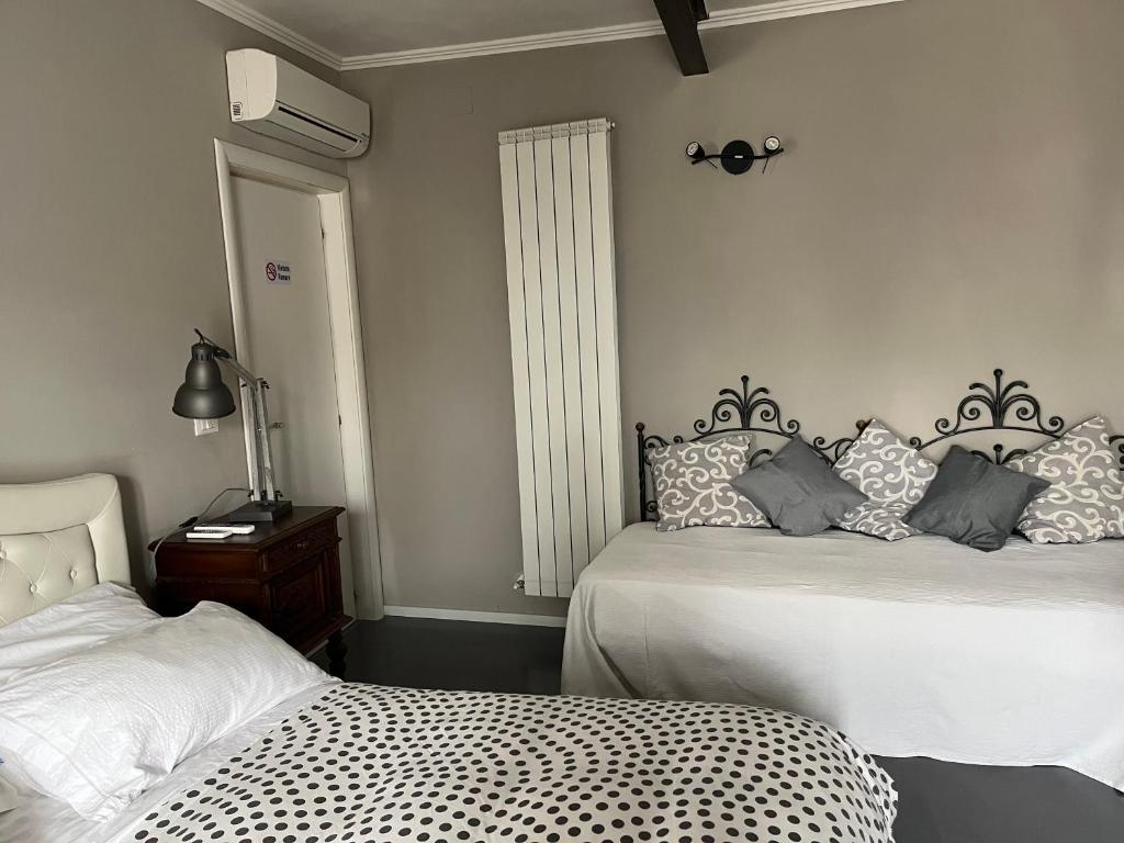 Posteľ alebo postele v izbe v ubytovaní B&B La Terrazza Sul Borgo