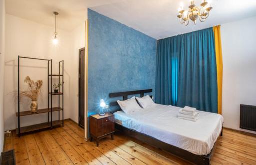Postel nebo postele na pokoji v ubytování casa akacia
