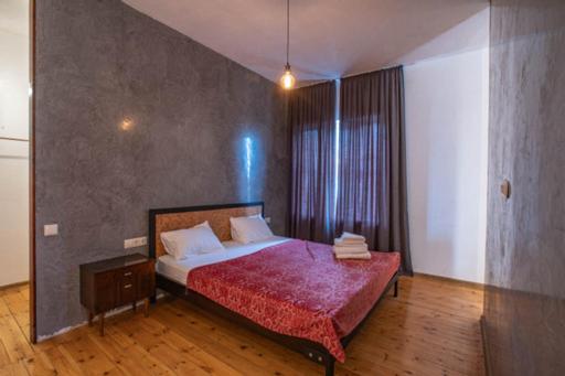 Postel nebo postele na pokoji v ubytování casa akacia
