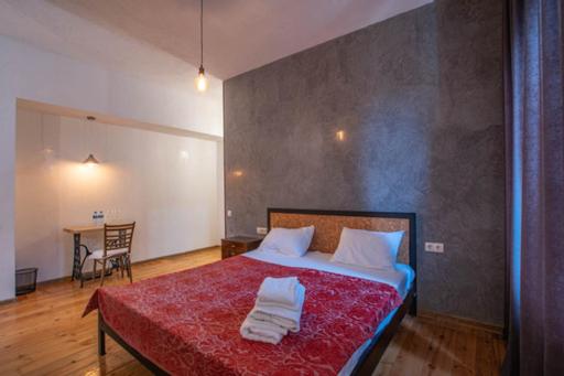 Postel nebo postele na pokoji v ubytování casa akacia