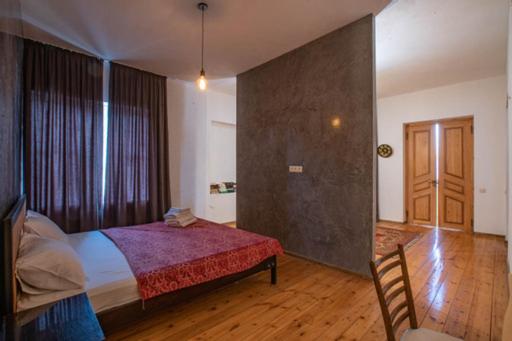 Postel nebo postele na pokoji v ubytování casa akacia