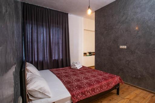 Postel nebo postele na pokoji v ubytování casa akacia