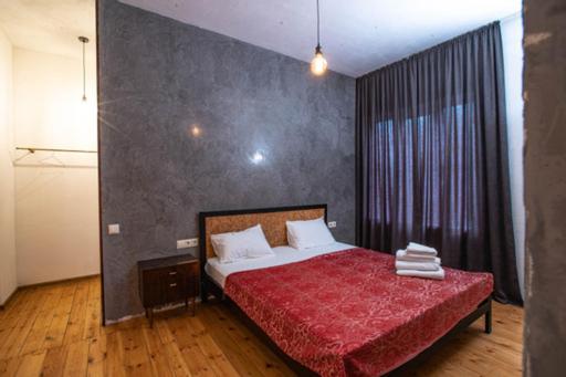 Postel nebo postele na pokoji v ubytování casa akacia