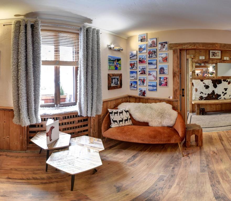 Posezení v ubytování Hôtel Les Cimes