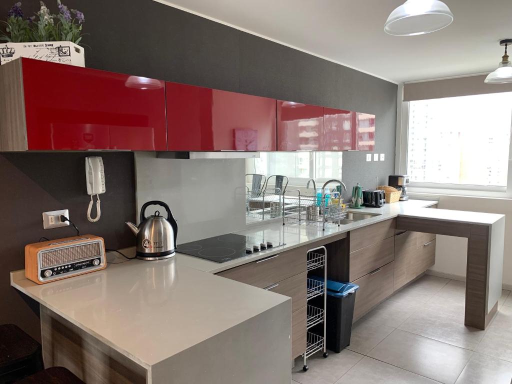 Kuchyň nebo kuchyňský kout v ubytování Tantum Concon Apartment
