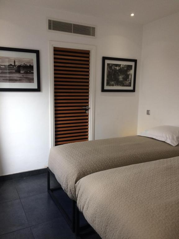 Postel nebo postele na pokoji v ubytování Riad Love B&B