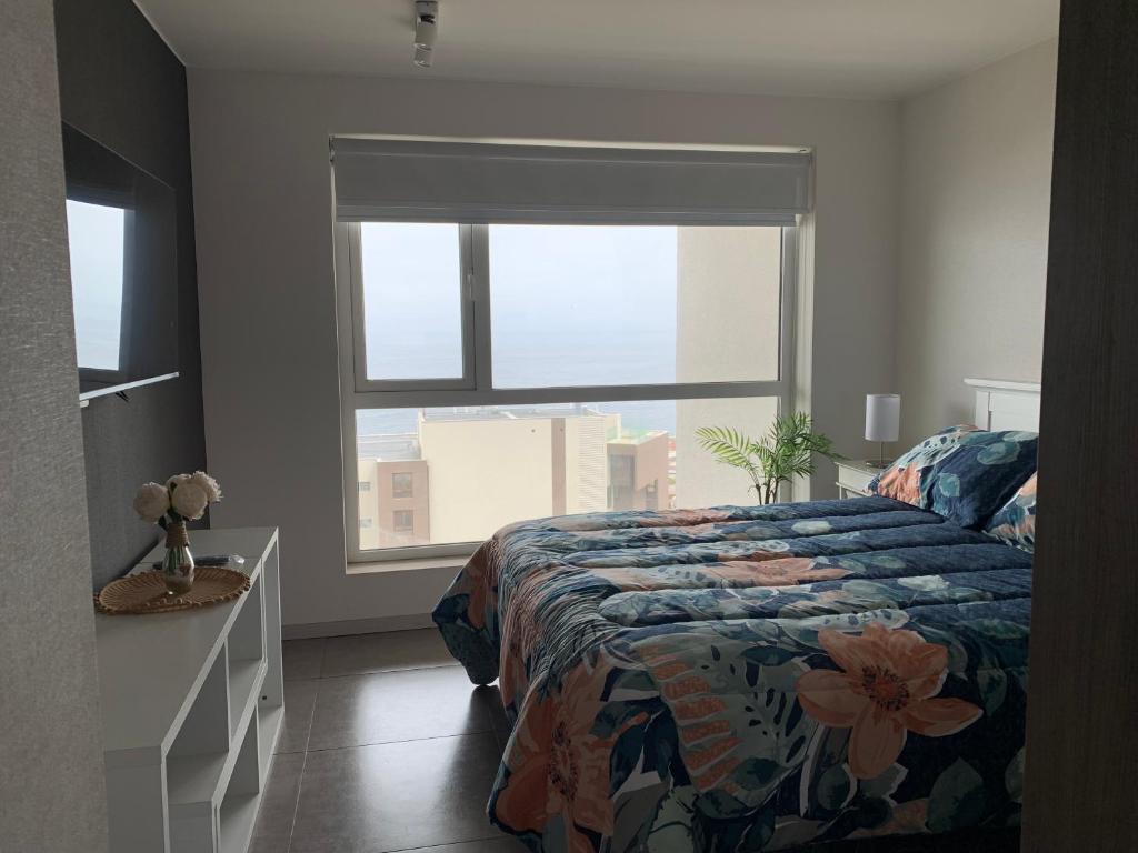 Postel nebo postele na pokoji v ubytování Tantum Concon Apartment