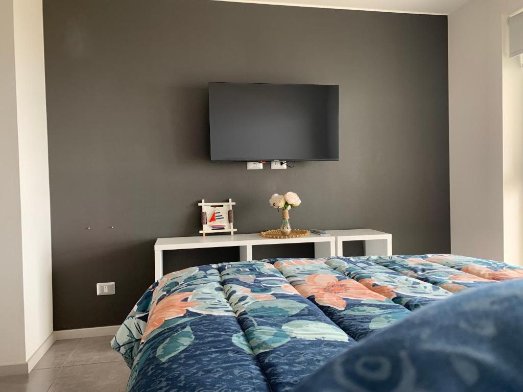 Postel nebo postele na pokoji v ubytování Tantum Concon Apartment