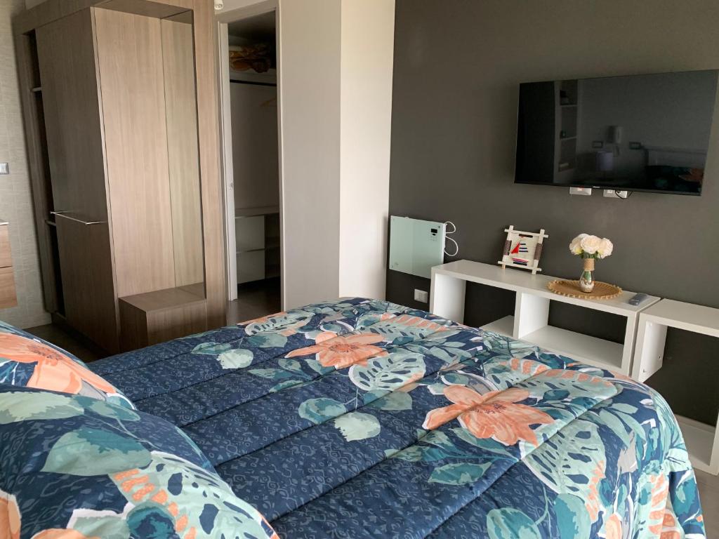 Postel nebo postele na pokoji v ubytování Tantum Concon Apartment