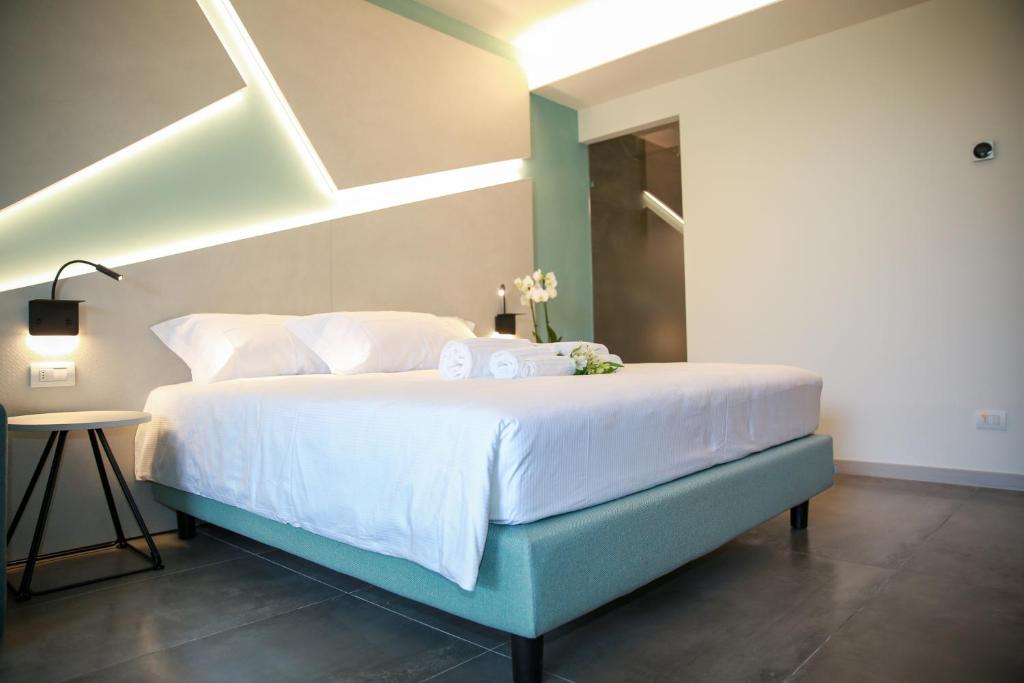 Postel nebo postele na pokoji v ubytování La Cipressina B&B