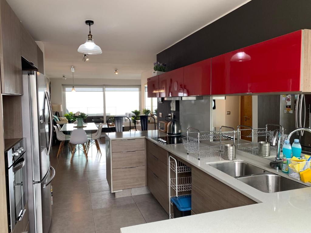 Kuchyň nebo kuchyňský kout v ubytování Tantum Concon Apartment