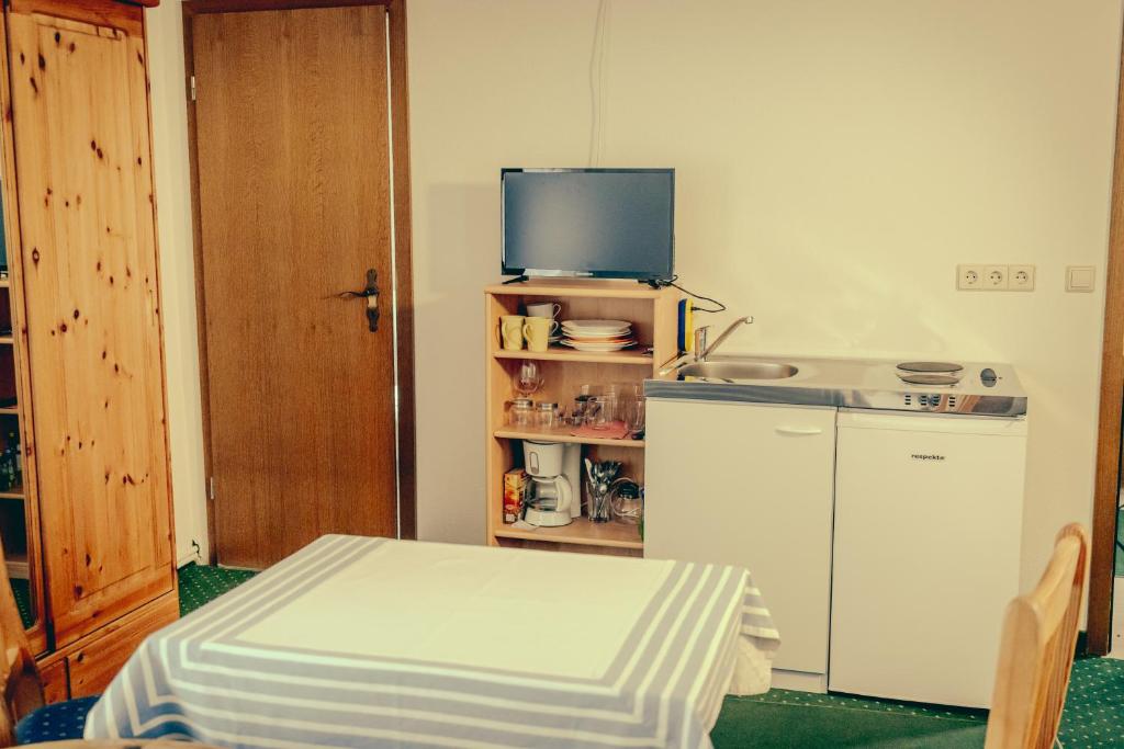 Kuchyň nebo kuchyňský kout v ubytování Inselgaestehaus-Erna