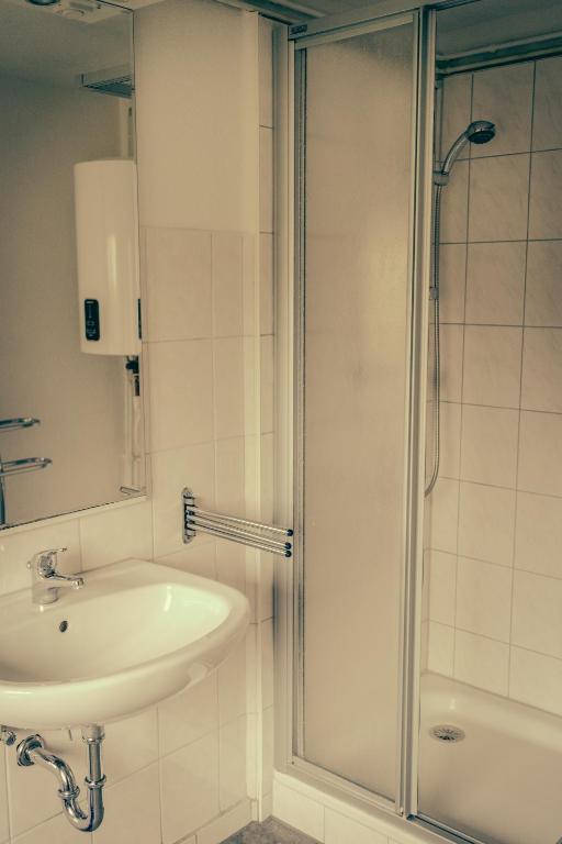 Koupelna v ubytování Inselgaestehaus-Erna