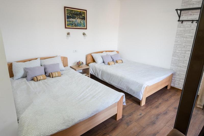 Postel nebo postele na pokoji v ubytování Apartmani Zapis Vrdnik