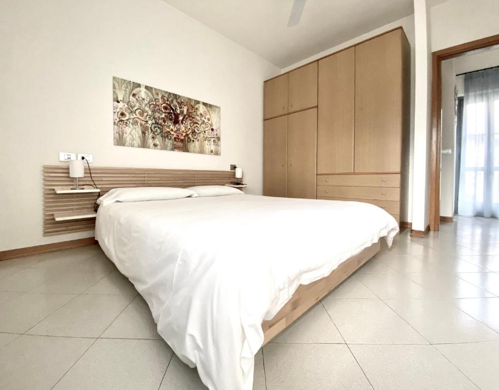 Postel nebo postele na pokoji v ubytování Regina lago di Como
