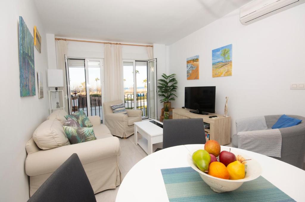 TV a/nebo společenská místnost v ubytování Apartamento con Vistas al mar