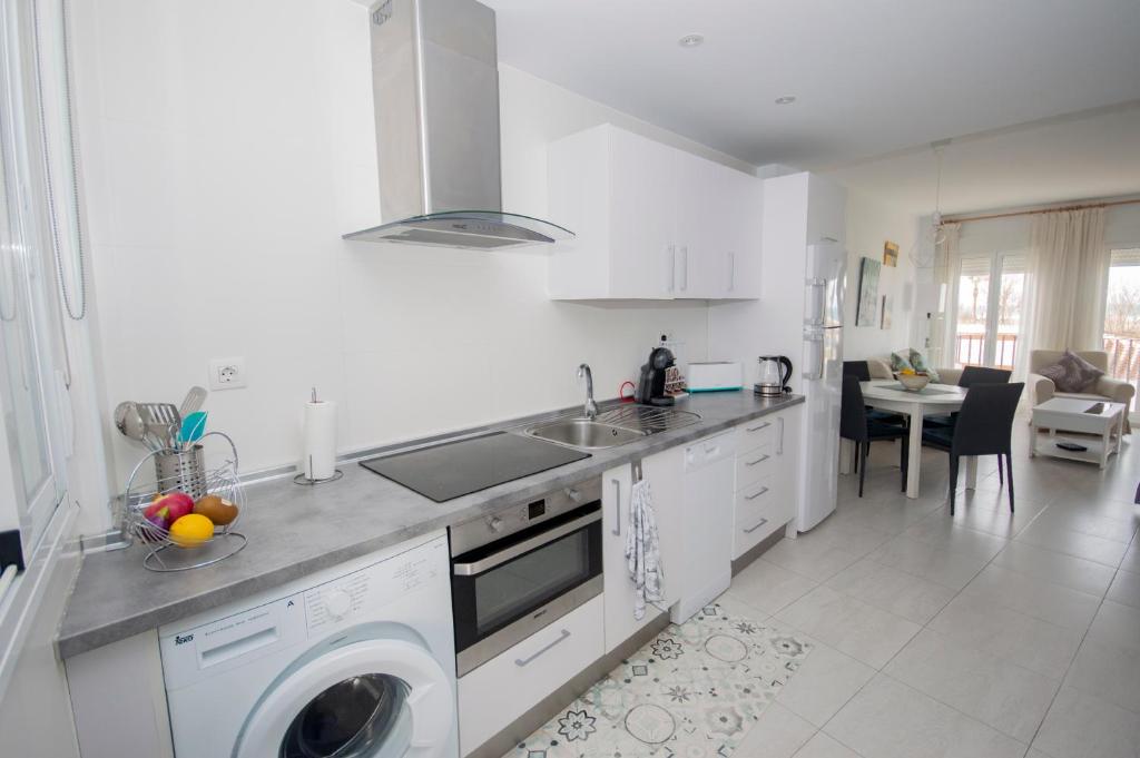 Kuchyň nebo kuchyňský kout v ubytování Apartamento con Vistas al mar