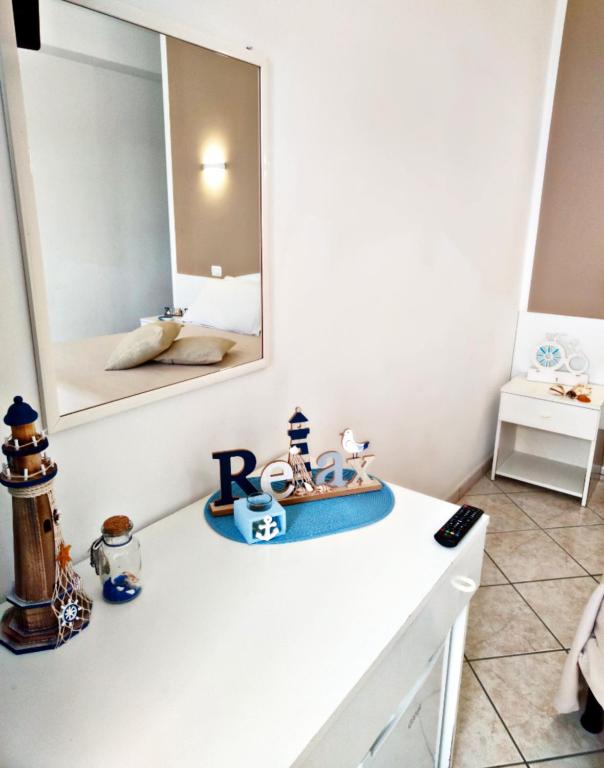 Postel nebo postele na pokoji v ubytování Hotel Baia del Cigno
