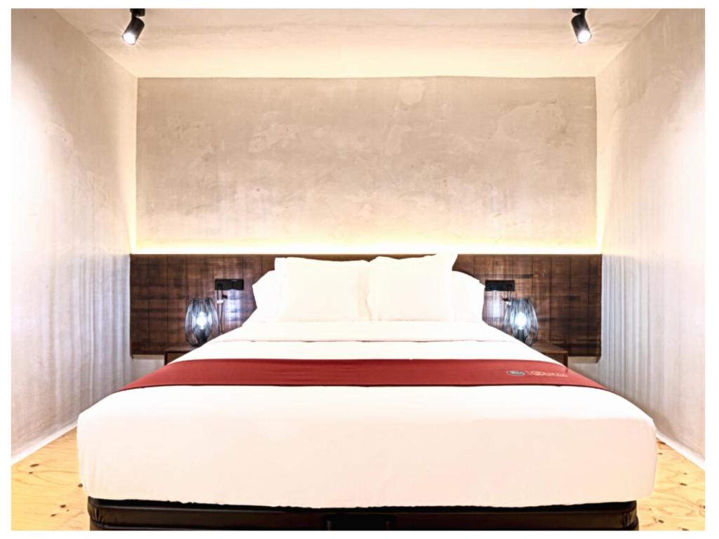 A bed or beds in a room at Casa Palacio Rodrigo de la Fuente by Príncipe David - Seis Apartamentos de Lujo -