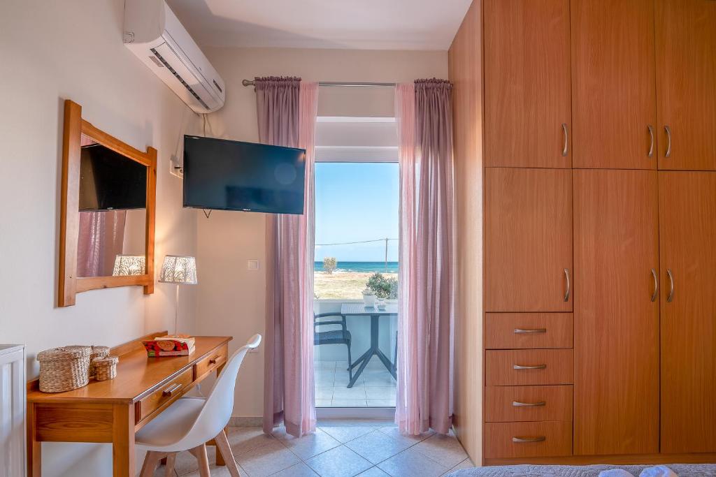 A television and/or entertainment centre at Sea Daffodil apartments