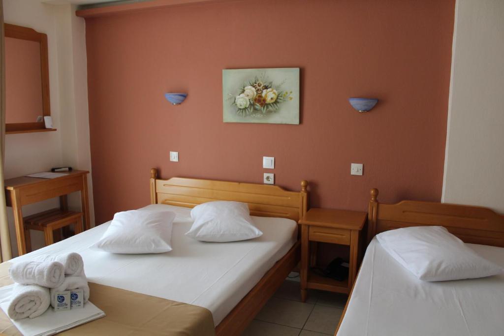 Postel nebo postele na pokoji v ubytování Atira Apartment Hotel