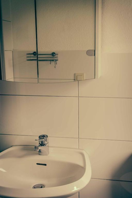 Koupelna v ubytování Inselgaestehaus-Erna