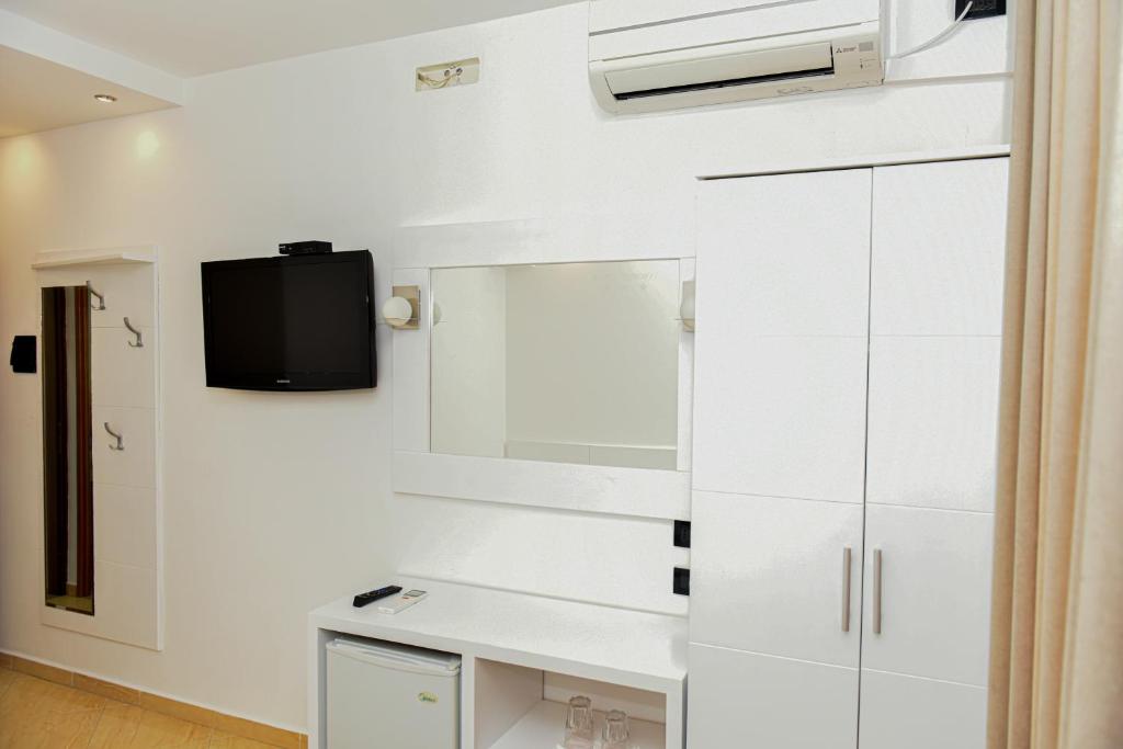 TV a/nebo společenská místnost v ubytování Hotel Tomorri