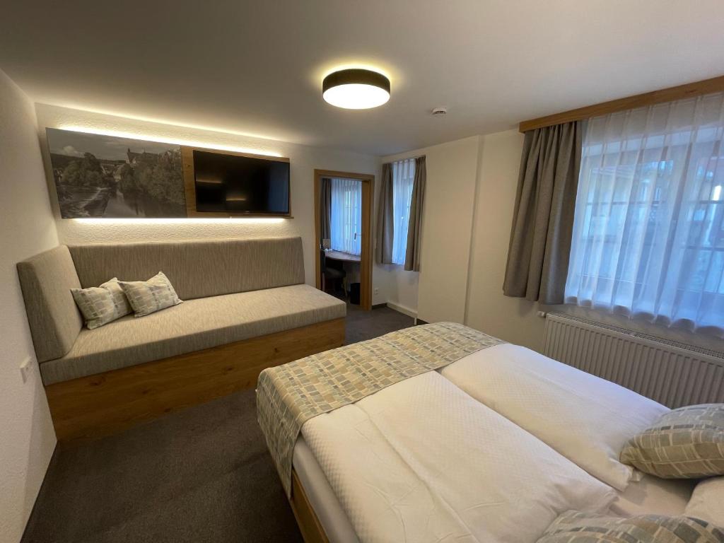 Postel nebo postele na pokoji v ubytování Gästehaus Klingler