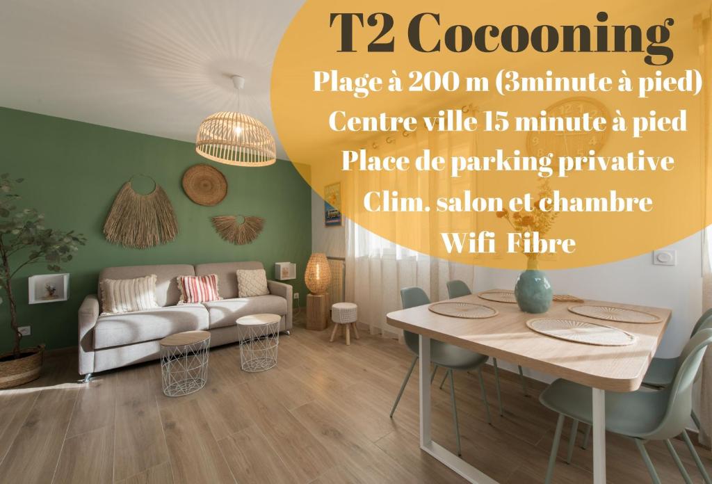 a living room with a couch and a table at Le Med - Apartment T2 Confort - Proche plage - Clim - Parking privé in La Ciotat