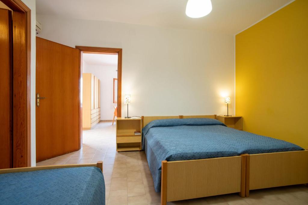 Posteľ alebo postele v izbe v ubytovaní Testa di Monaco - Basic Beach Accommodations