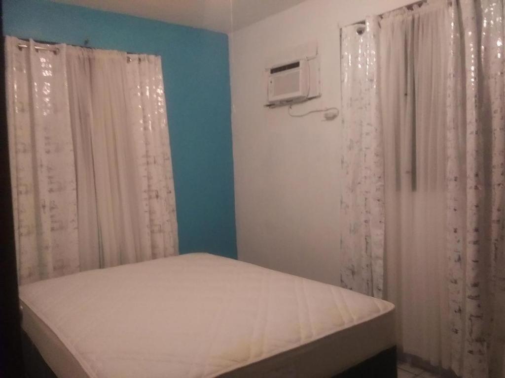 Postel nebo postele na pokoji v ubytování Labadie Apartment