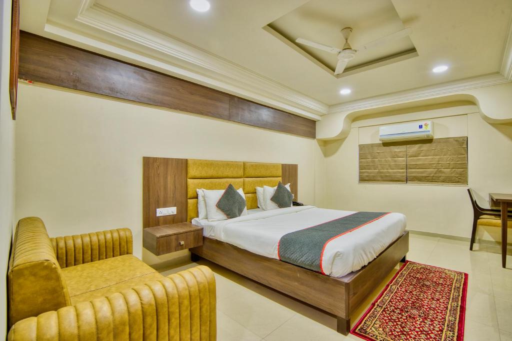 Postel nebo postele na pokoji v ubytování Alba Premier, Ahmedabad