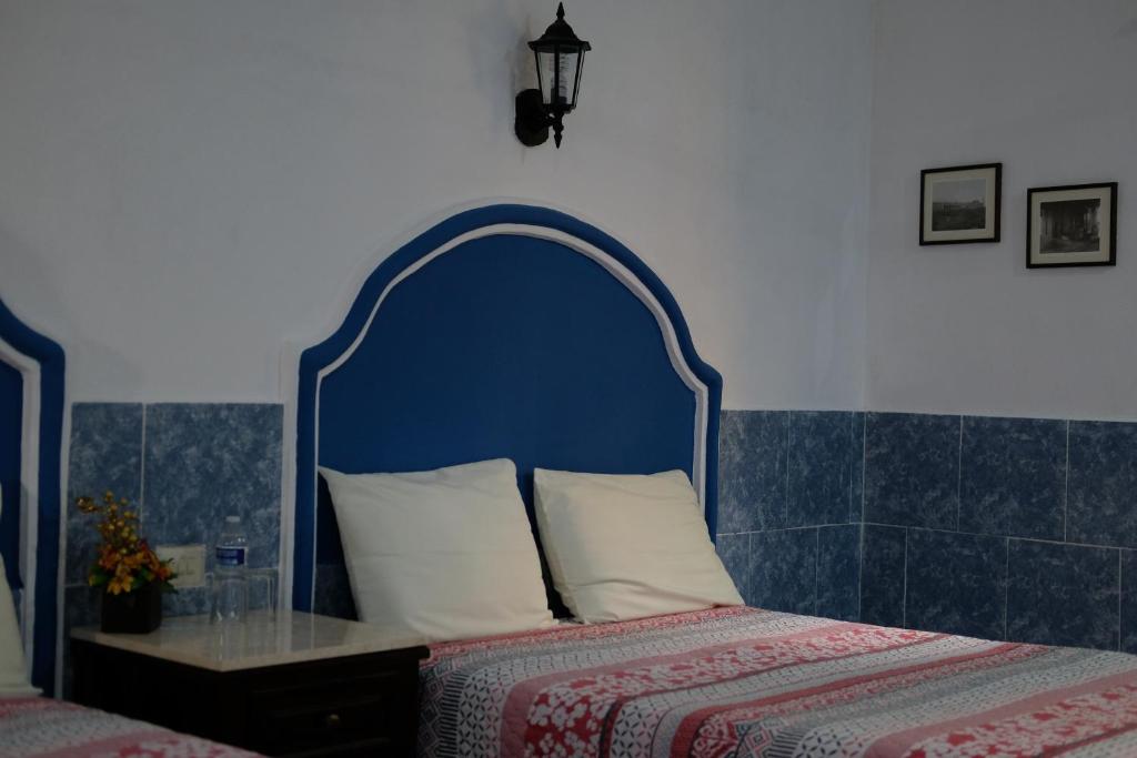 Postel nebo postele na pokoji v ubytování Posada Ya´ax Ich