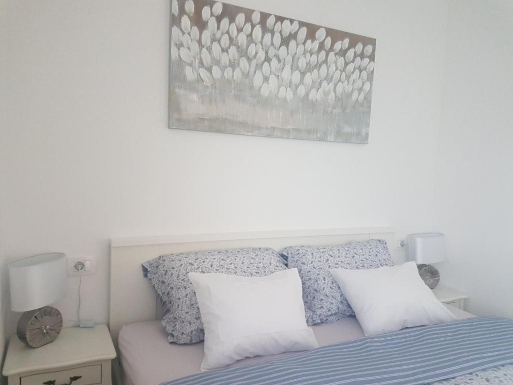 Postel nebo postele na pokoji v ubytování Gita Apartmani