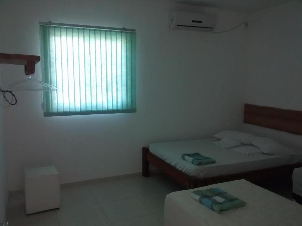 Aconchego dos Milagres - Three-Bedroom House