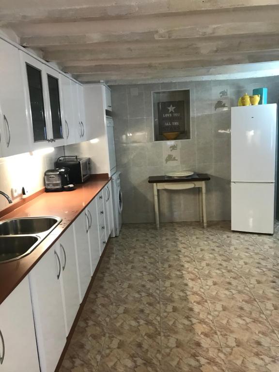 Kuchyň nebo kuchyňský kout v ubytování Casa Maltea