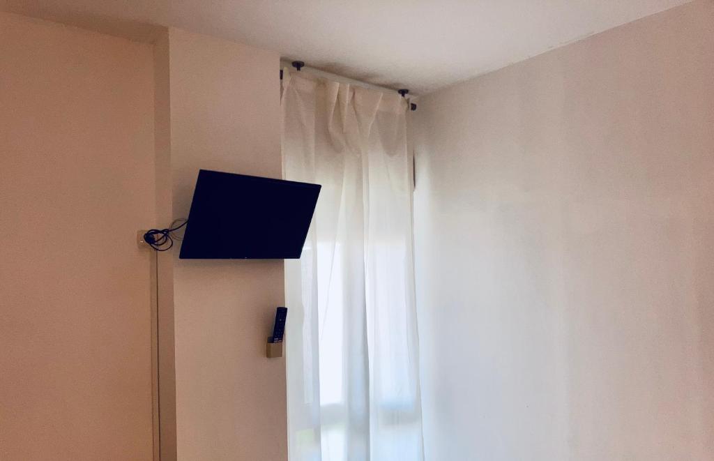 TV a/nebo společenská místnost v ubytování APARTAMENTO PINAPLAYA