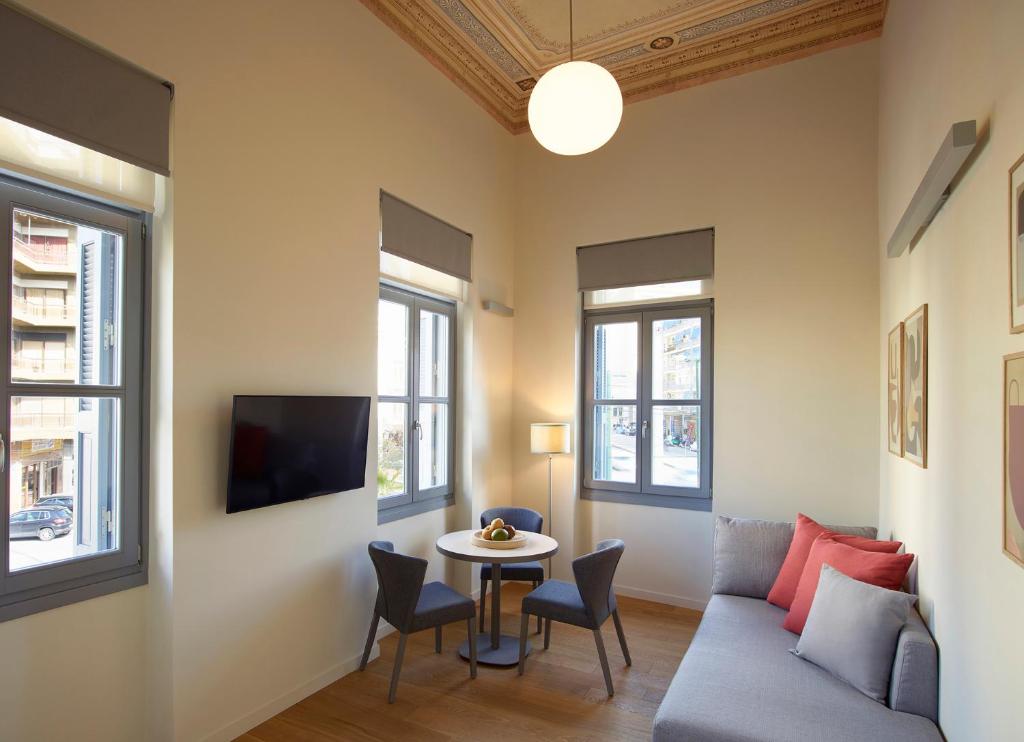 a living room with a couch and a table at Del Taso 1850 in Athens
