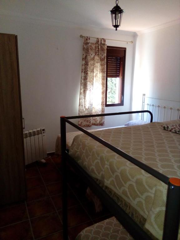 Posteľ alebo postele v izbe v ubytovaní CASA RURAL El Paso