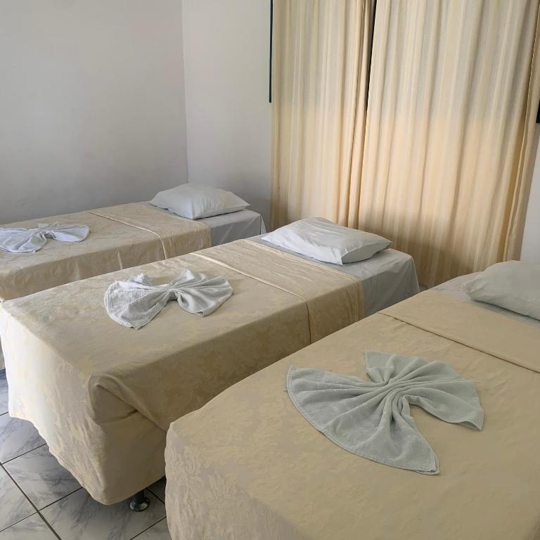 Postel nebo postele na pokoji v ubytování CALDAS PALACE HOTEL JORRO