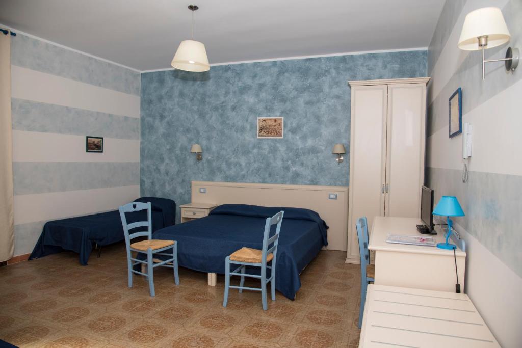 Postel nebo postele na pokoji v ubytování La Lanterna Di BaChi