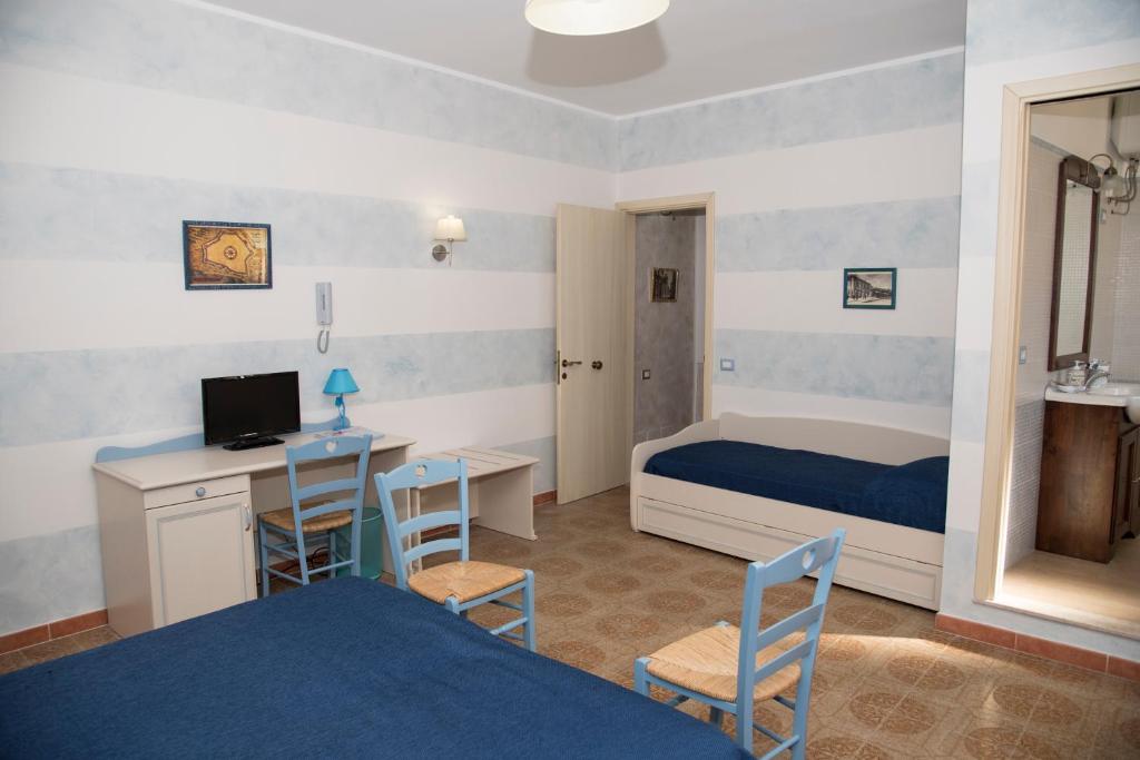 Postel nebo postele na pokoji v ubytování La Lanterna Di BaChi