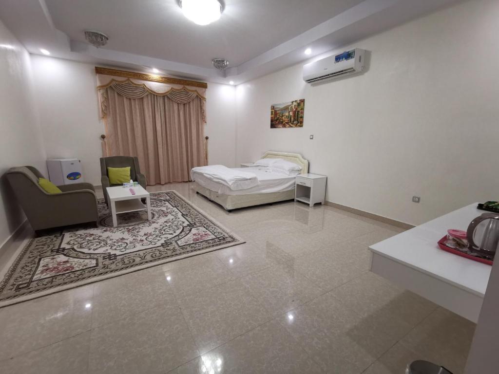 بيت العز السياحي Al-Ezz Tourist House - Habitación Doble Superior Con Vista Al Jardín