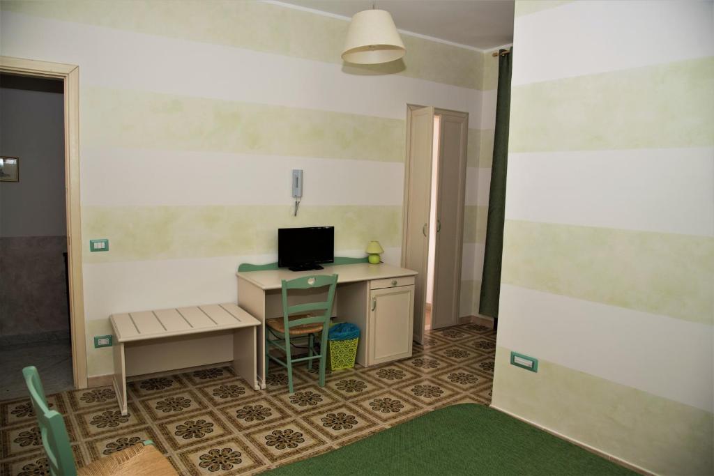 TV a/nebo společenská místnost v ubytování La Lanterna Di BaChi