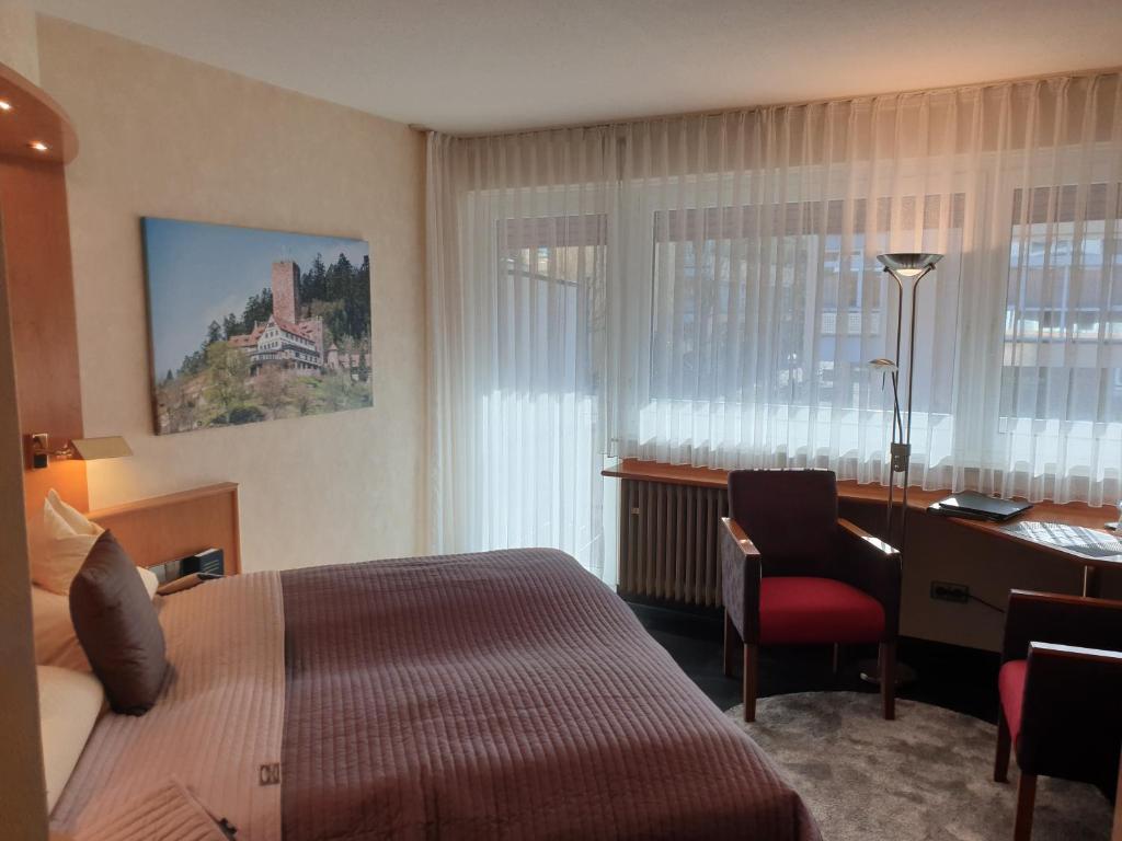 Postel nebo postele na pokoji v ubytování Hotel Koch