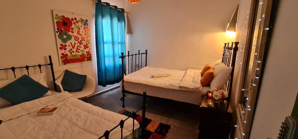 Postel nebo postele na pokoji v ubytování Atlantic Hostel