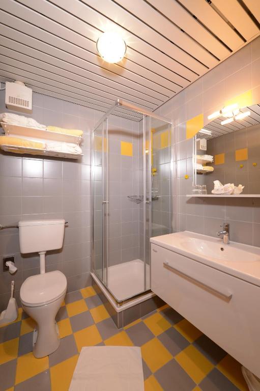 Koupelna v ubytování Strandhotel Faak