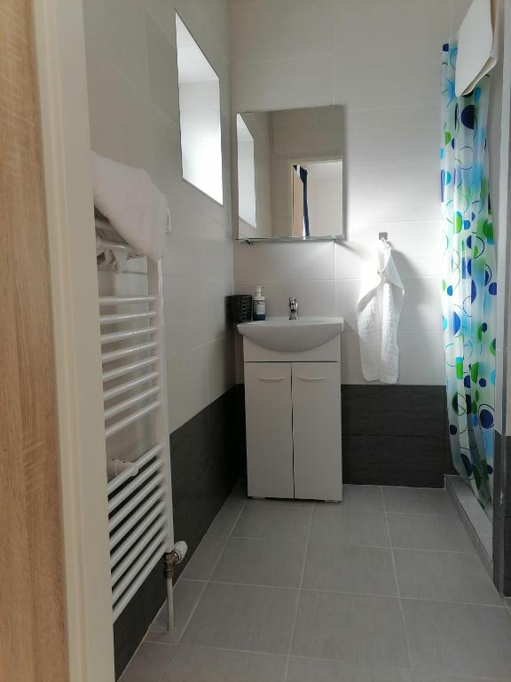Kuchyň nebo kuchyňský kout v ubytování Apartmány Amália