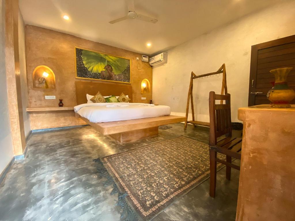 Postel nebo postele na pokoji v ubytování Chique Shanti Resort