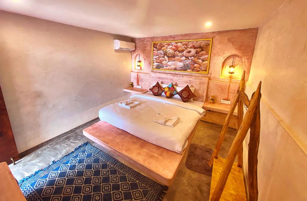 Postel nebo postele na pokoji v ubytování Chique Shanti Resort